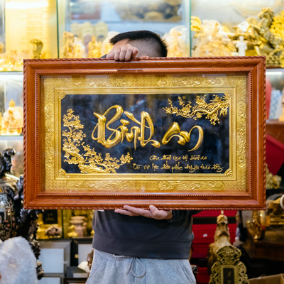 Tranh Đồng Chữ Bình An Thư Pháp Dát Vàng Khung Gỗ Gõ Đỏ 50cm x 80cm